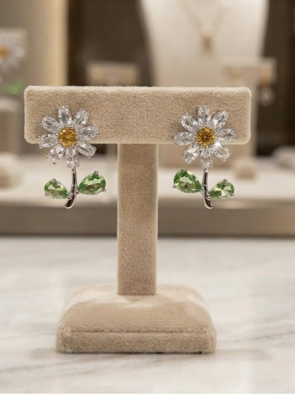The Eleanor Collection Crystal Daisy Floral Earrings Green Leaves 1”.
